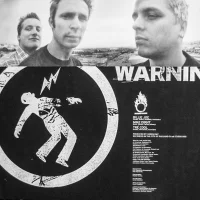 Warning - vinyl LP insert - front