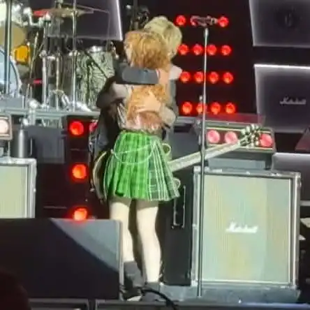 Alana Corrado onstage with Green Day