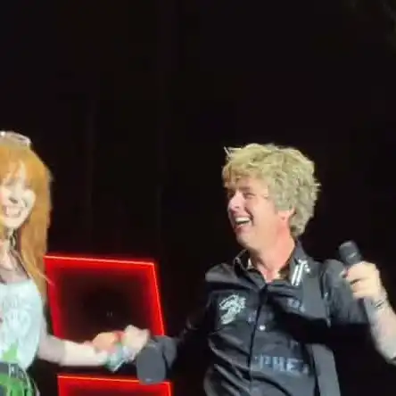 Alana Corrado on stage with Green day