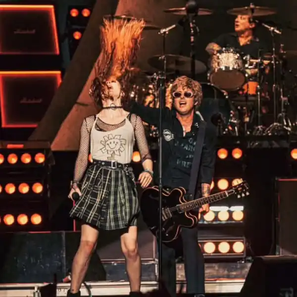 Alana C. on stage with Green Day
