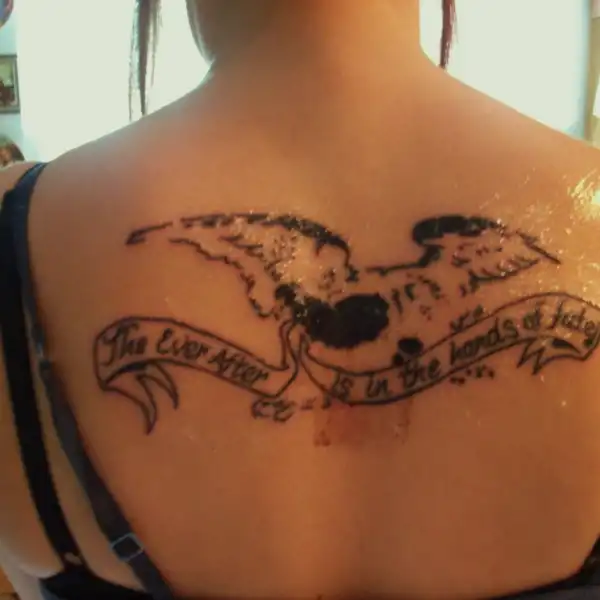 Text with Wings Tattoo