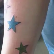 Multicolored Star with Calligraphic Characters Tattoo