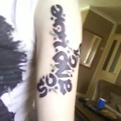 Son of Rage Text Tattoo