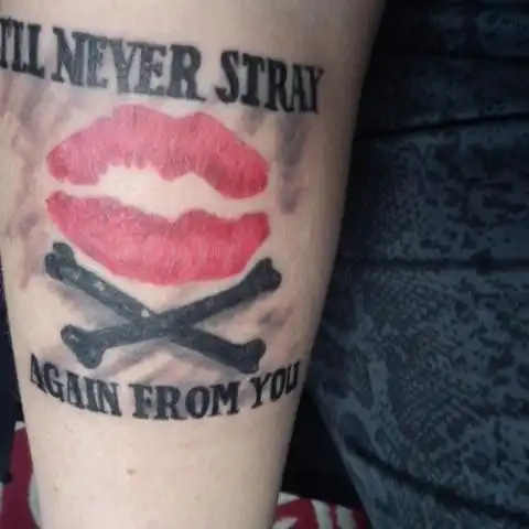 Kiss and Crossbones Tattoo