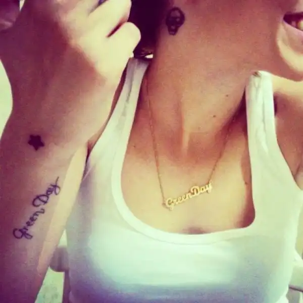 Green Day Text and Skull Tattoo