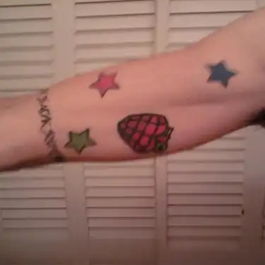 Billie Joe Multicolored Stars Tattoo
