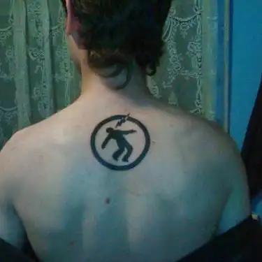 Warning Man Logo Tattoo
