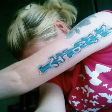 Green Day Minority Logo Tattoo