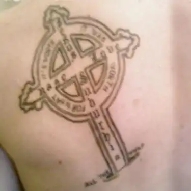 Celtic-Style Ring Cross Tattoo