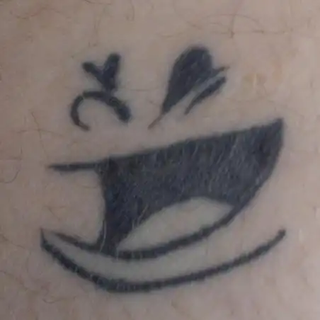 Face Logo Tattoo