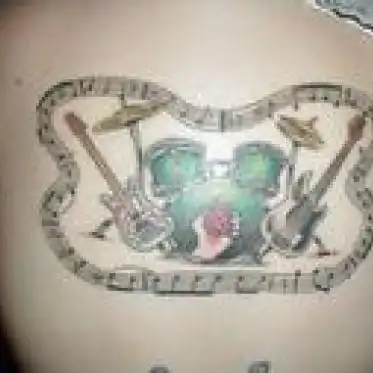 Green Drum Kit with Flanking Guitars Tattoo
