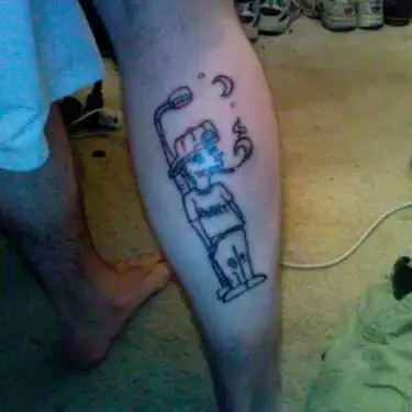 Cartoon Figure Tattoo