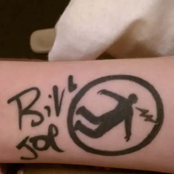 Warning Man Logo Tattoo