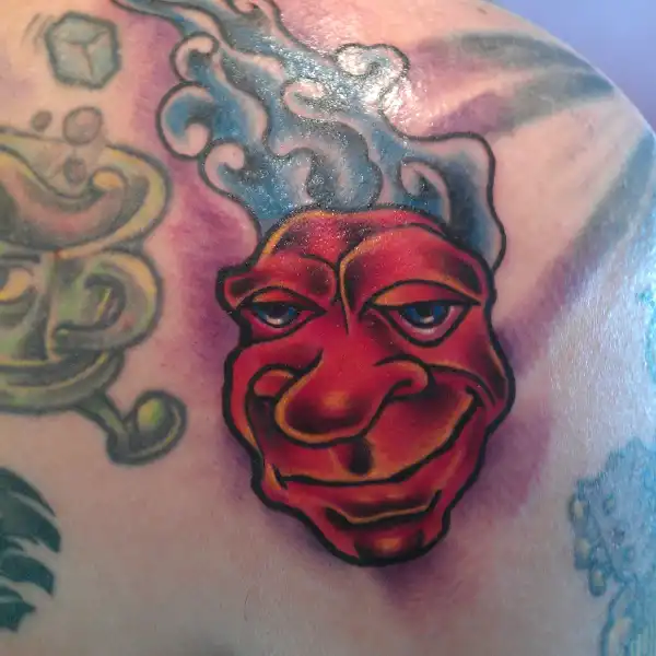 39/Smooth Grinning Face Tattoo