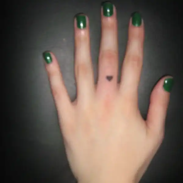 Heart on Finger Tattoo