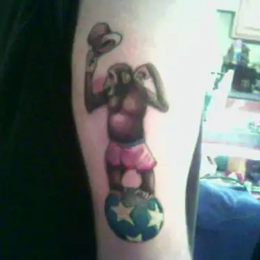 Monkey Balancing on Star Ball Tattoo