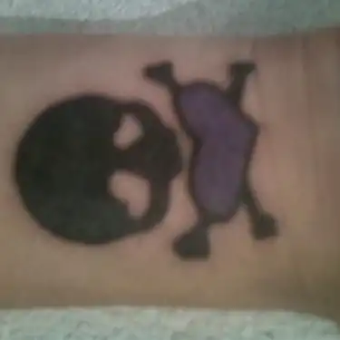 Heart-Eyed Skull Tattoo