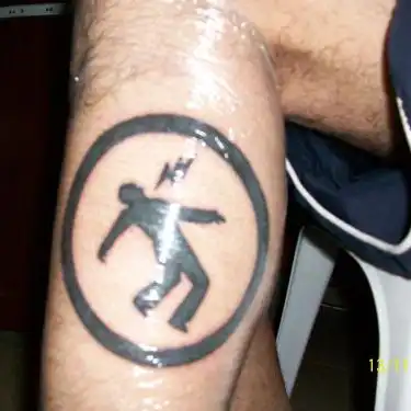 Warning Man Logo Tattoo