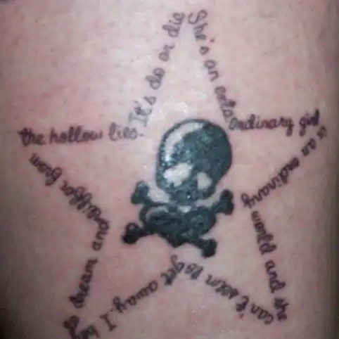 Extraordinary Girl Lyric Star with Skull Tattoo