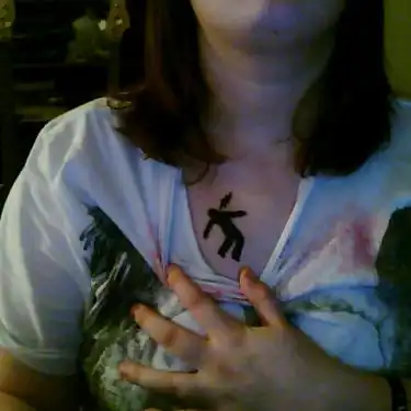 Warning Man Logo Tattoo