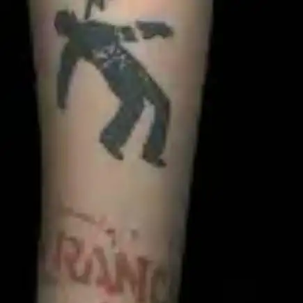 Warning Man Logo Tattoo