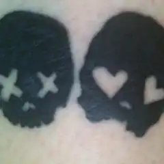 Skull with Heart Eyes Tattoo