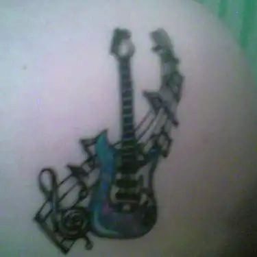 Blue Guitar and Music Notes Tattoo