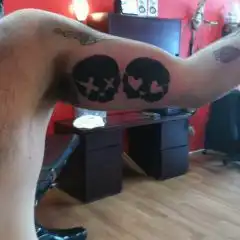 Skulls with Heart Eyes Tattoo