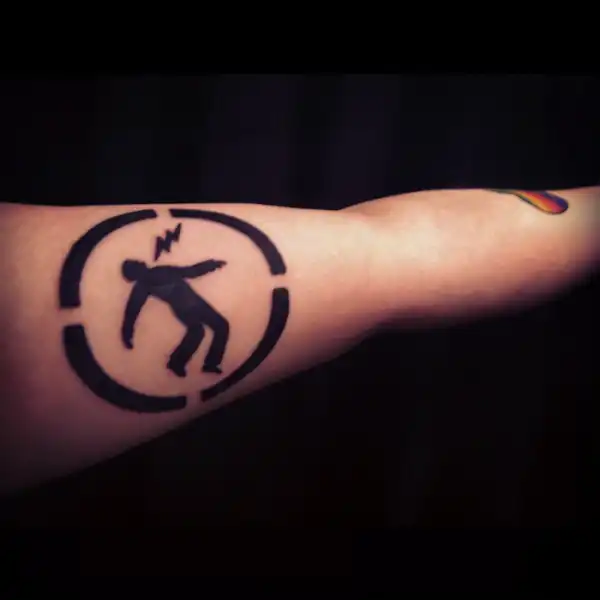Warning Man Logo Tattoo