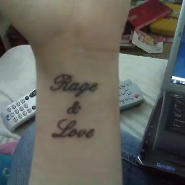 Rage and Love Text Tattoo