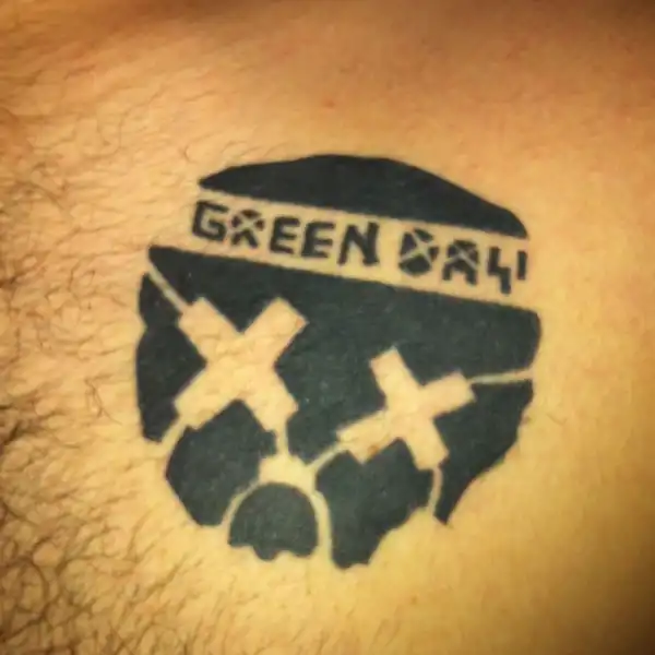 Green Day Skull and Crossbones Tattoo
