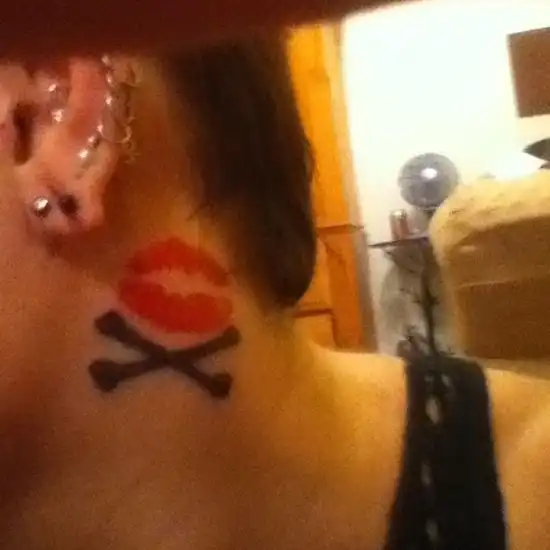 Kiss and Crossbones Tattoo