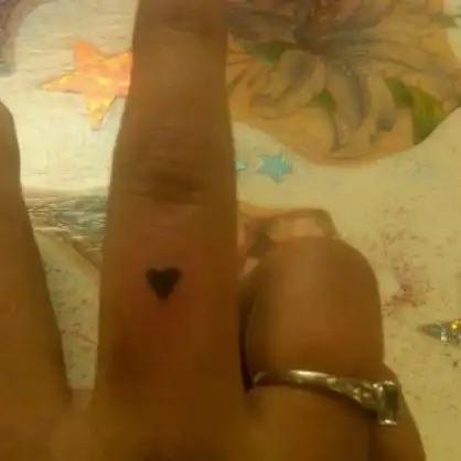 Billie Joe Finger Heart Tattoo