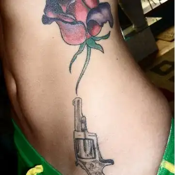 Rose and Revolver Tattoo