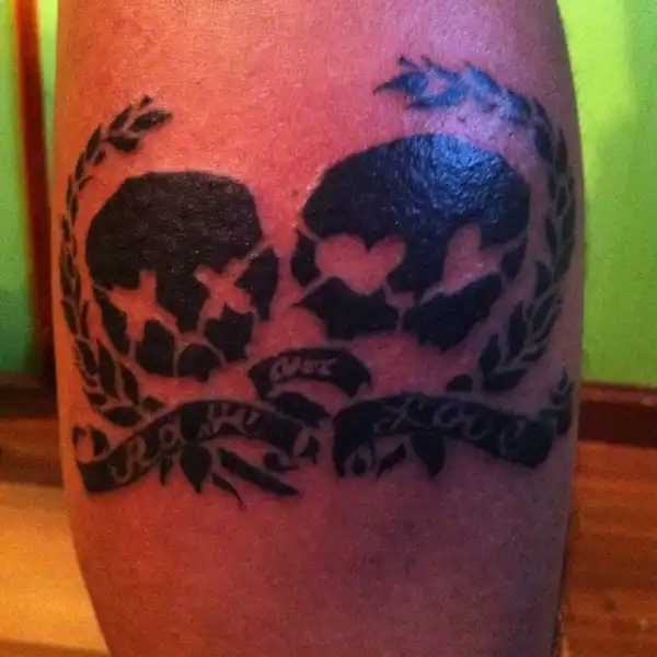 Rage and Love Skull Tattoo