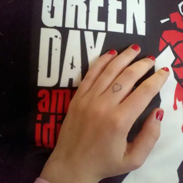 Heart on Finger Tattoo