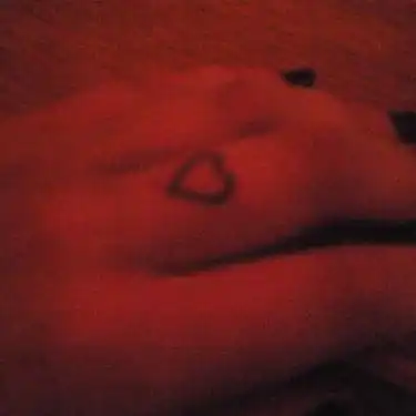 Small Heart Finger Tattoo
