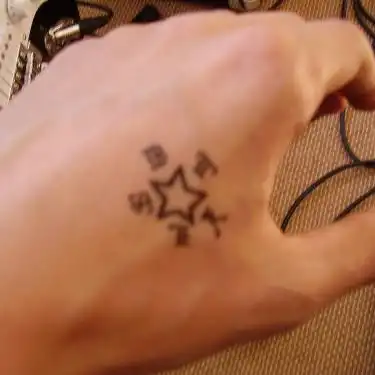 Star with Lettering Tattoo