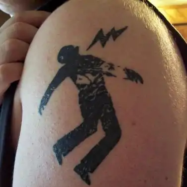 Warning Man Logo Tattoo