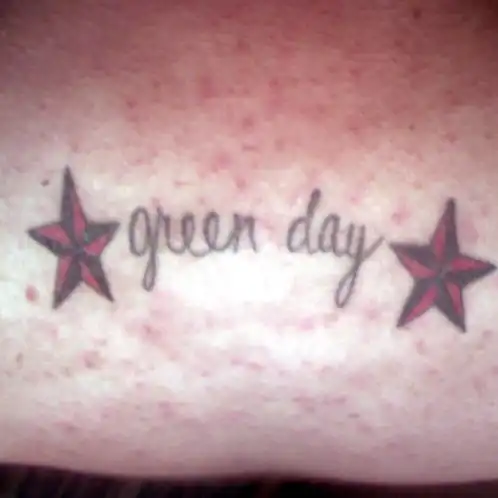 Green Day Logo with Red and Black Stars Tattoo
