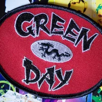 Red, black and silver dragon logo patch
