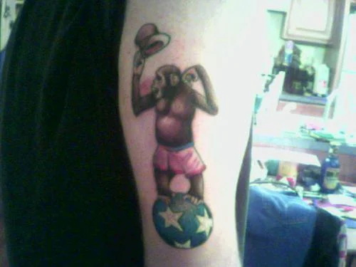 Monkey Balancing on Star Ball Tattoo