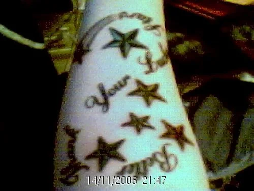 Stars with Cursive Script Tattoo