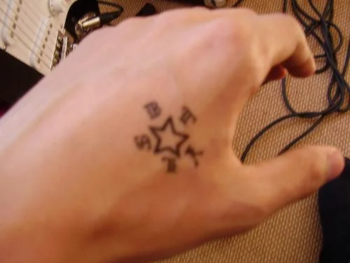 Star with Lettering Tattoo