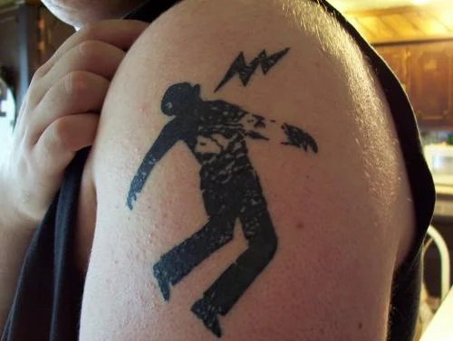 Warning Man Logo Tattoo