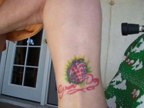 American Idiot Heart Grenade with Green Day Script Tattoo