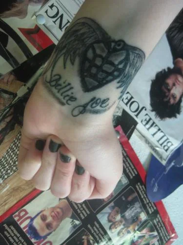 American Idiot Heart Grenade with Wings and Billie Joe Script Tattoo
