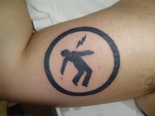 Warning Man Logo Tattoo