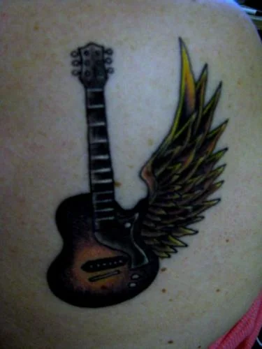 Winged guitar