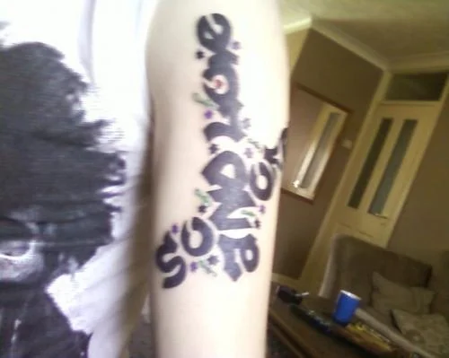 Son of Rage Text Tattoo